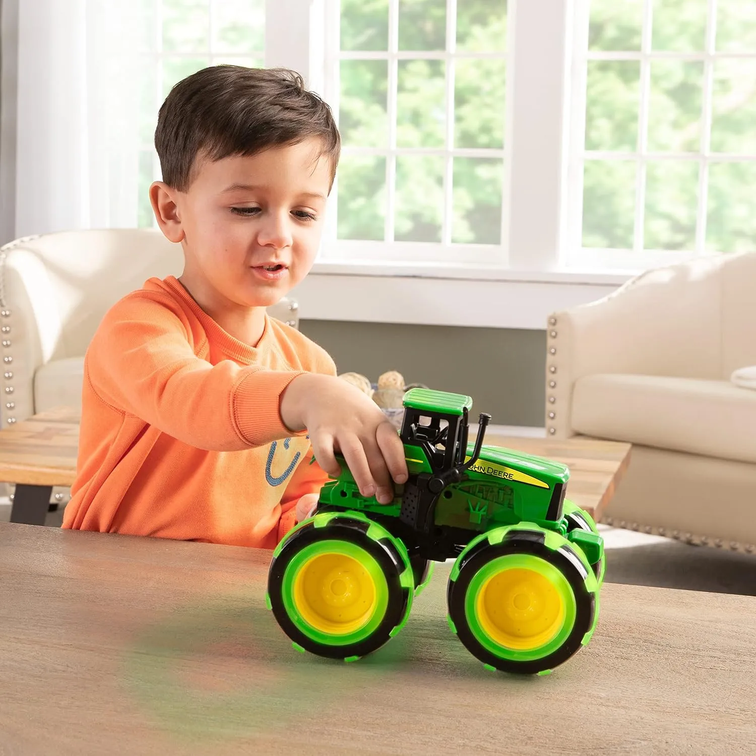 TOMY Monster Treads Lightning Wheels - John Deere Tractor - Motion Activated Light Up Monster Truck Toy - John Deere Tractor Toys with Monster Truck Tires - Ages 3 Years and Up