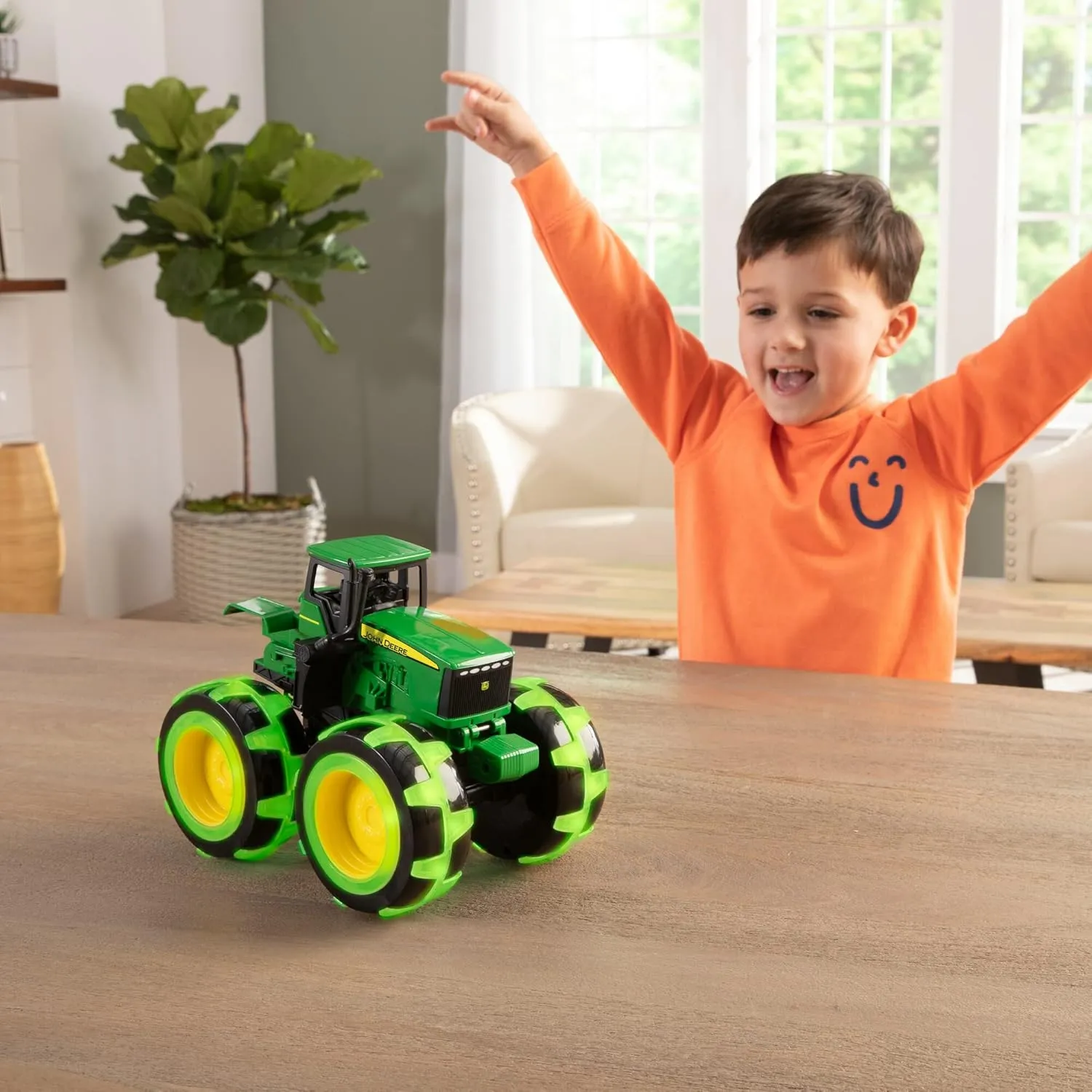 TOMY Monster Treads Lightning Wheels - John Deere Tractor - Motion Activated Light Up Monster Truck Toy - John Deere Tractor Toys with Monster Truck Tires - Ages 3 Years and Up